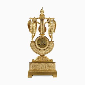 Reloj de lira de época Imperio de bronce dorado con busto de Homero, década de 1810