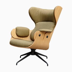 Sillón en verde de madera de juego y nogal de Jaime Hayon