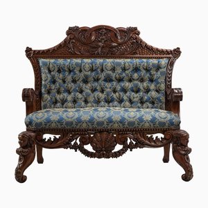 Blue Mahogany Sofa with Indian Head Decor
