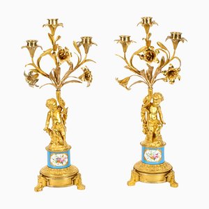 Candelabros de porcelana azul celeste y ormolu de Sevres, siglo XIX. Juego de 2