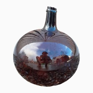 Botella antigua de vidrio soplado marrón