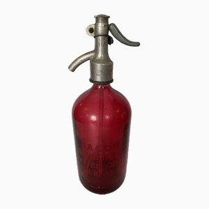 Botella de refresco vintage de vidrio rojo, años 20