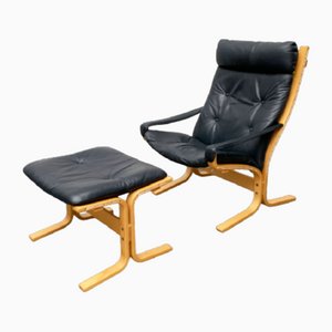 Sillón Siesta noruego de cuero con otomana de Ingmar Relling para Ekornes. Juego de 2