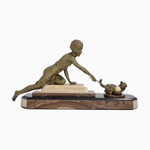 Figura Art Déco de dama jugando con un gato, años 20