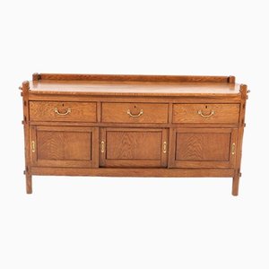 Credenza Arts & Crafts in quercia di Alexander J. Kropholler, inizio XX secolo