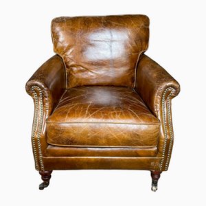 Vintage English Leather Armchair with Brass Wheels