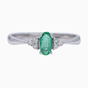 18 Karat White Gold, Emerald and Diamonds Engagement Ring