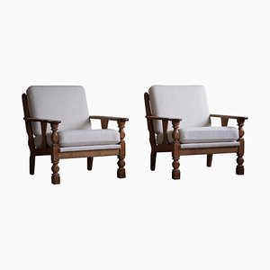 Danish Modern Lounge Chairs in Oak and Bouclé by Henning Kjærnulf, 1960s, Set of 2