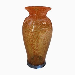 Große orange Vase mit silbernem Boden