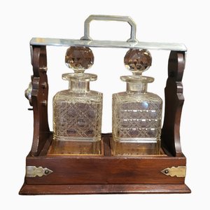 20th Century Cut Glass Decantars and Stoppers on Wood Metal and Brass Framed Tantalus, Set of 3