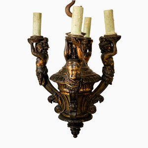 Lámpara de araña con cuatro figuras mitológicas griegas, década de 2010