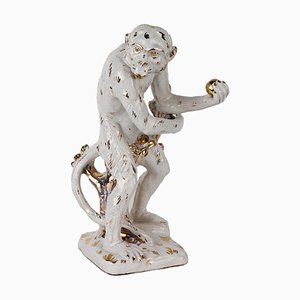 Statuetta di scimmia in terracotta smaltata