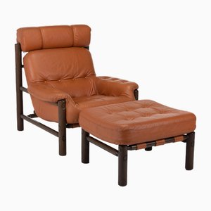 Brutalist Lounge Chair and Ottoman in Cognac Leather by Jean Gillon for Percival Lafer, 1970s, Set of 2