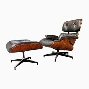 Lounge Chair and Ottoman in Rosewood by Charles & Ray Eames for Herman Miller, 1970s, Set of 2
