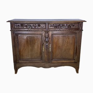 19th Century Low Buffet in Carved Oak with Flower Details
