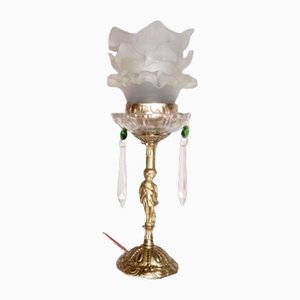 Lámpara de mesa con figura de Cupido de bronce y vidrio, años 20