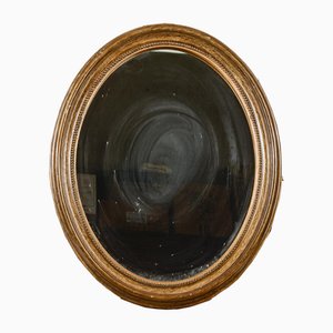 Marco antiguo ovalado dorado con espejo, década de 1890