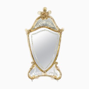 Espejo veneciano en forma de escudo