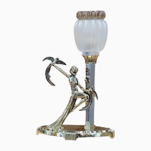 Lámpara de mesa con figura de dama y palomas Art Déco de bronce dorado, años 20