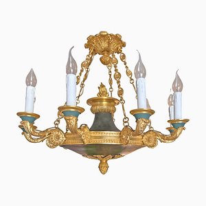 Lampadario Impero a 10 luci in bronzo dorato