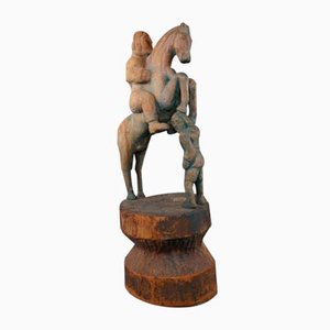 Escultura antigua de madera de hombre a caballo