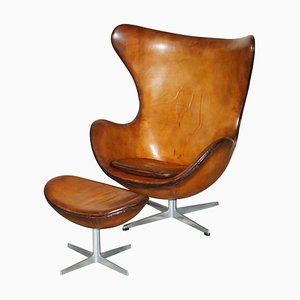 Egg Chair and Footstool in Brown Leather from Fritz Hansen, 1968, Set of 2