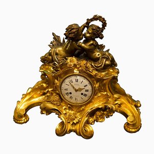 Antique French Louis XV Style Figural Mantel Clock in Gilt Bronze