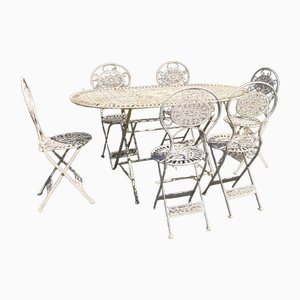Französischer Gartentisch und Stühle aus Metall, 7 . Set