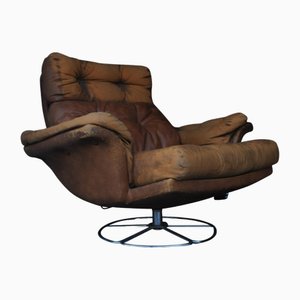 Tan Leather Armchair with Removable Cushions on a Chromed Circular Base by Bruno Mathsson for Dux