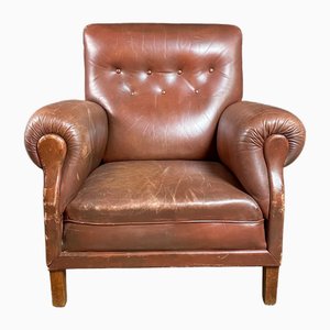 Poltrona grande in pelle marrone