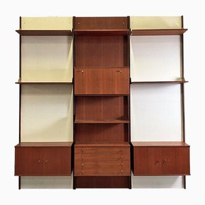 Librería modular de pared italiana Mid-Century moderna de teca y latón, años 60