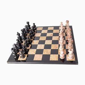Tablero de ajedrez francés de mármol rosa y negro, años 80. Juego de 33