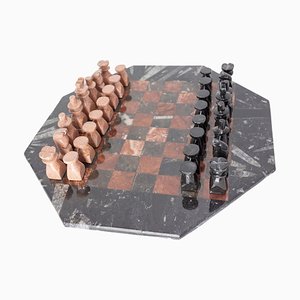 Tablero de ajedrez francés octogonal de mármol rojo y negro, años 80. Juego de 33