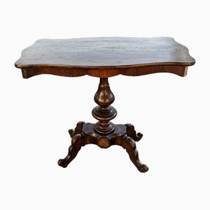 Tavolino con base tornita e intagliata