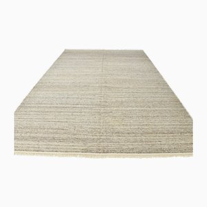 Kelim Teppich aus Wolle mit Pompon