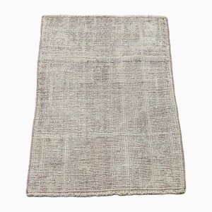 Grand tapis violet surteint