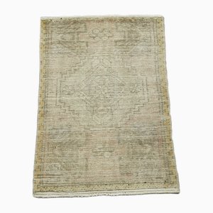 Tappeto vintage beige sovratinto