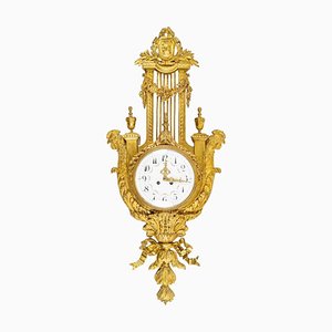 Reloj de bronce dorado del siglo XIX