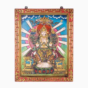 Pintura en relieve tibetano que representa a la deidad Tara blanca