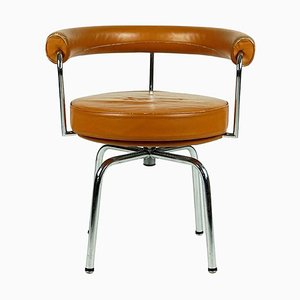 Vintage LC7 Cognac Leather & Chrome Swivel Chair by Charlotte Perriand attributed to Cassina