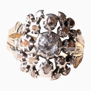 Oro y plata vintage de 18 k con diamante de talla brillante en el centro y diamantes de talla rosetón, años 90