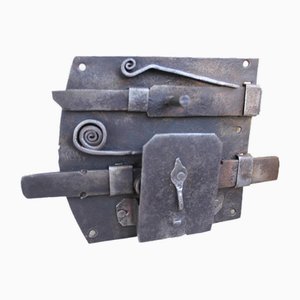 Mecanismo de cerradura de puerta de hierro forjado, años 40