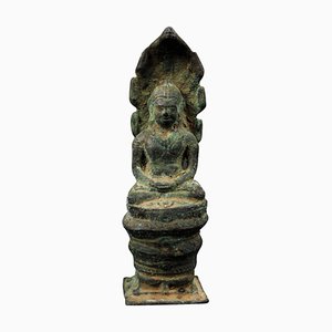 Artista jemer de la época de Angkor, Escultura de Buddha Naga, 1200, Bronce