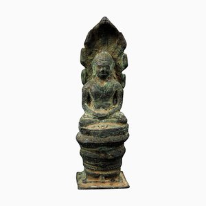 Artista Khmer del periodo di Angkor, scultura di Buddha Naga, 1200, bronzo