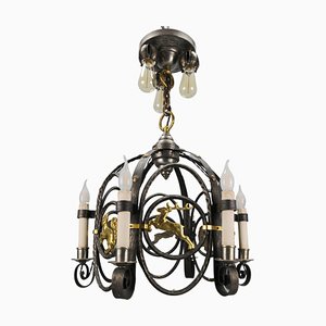 Lámpara de araña Art Déco de hierro forjado y latón con animales, años 20