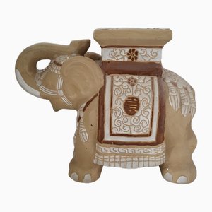 Mesa auxiliar con base de elefante esmaltada