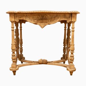 Mesa de centro de estilo neorrenacentista de nogal, siglo XIX