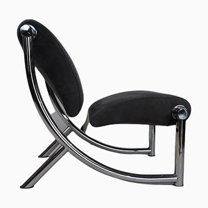 Futuristischer Sessel mit Gestell aus verchromtem Stahl
