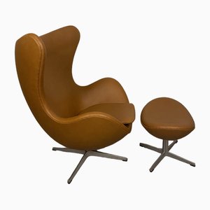 Egg Chair with Ottoman by Arne Jacobsen for Fritz Hansen, 2004, Set of 2