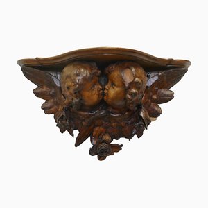 Cherubino antico in legno intagliato, 1850
